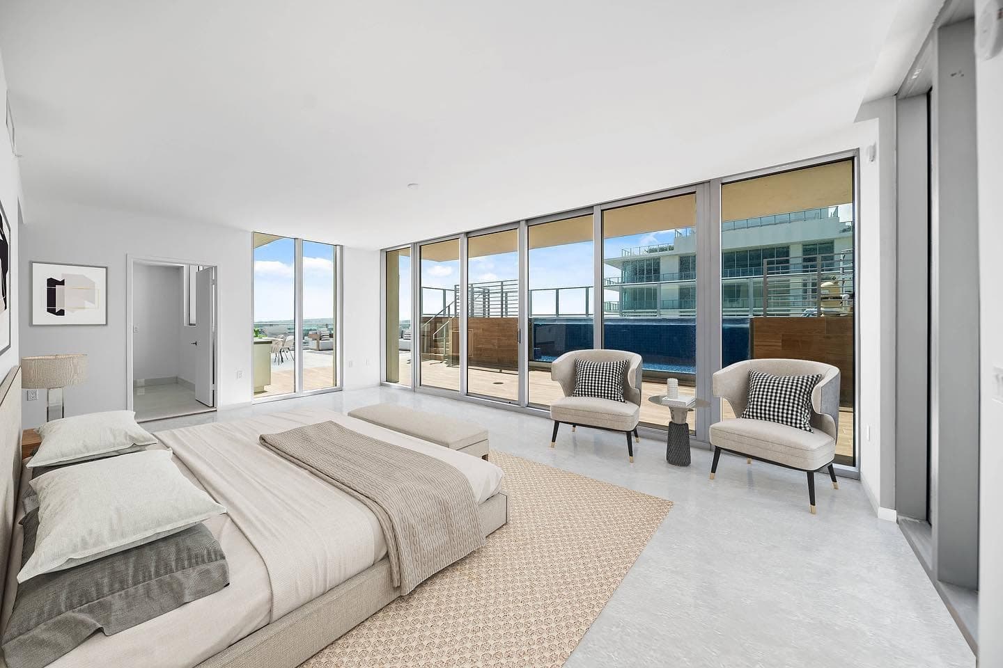 Primary bedroom with private terrace and pool
